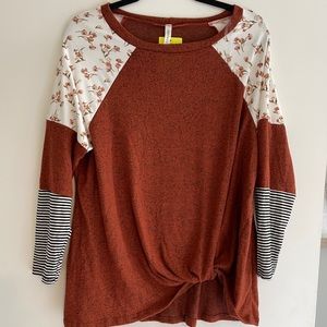 Burnt red floral and stripe knot front top